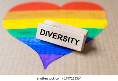 Gay Pride Lgbtq In Form Of Heart With DIVERSITY Word On Wooden Block. LGBT Rights Equality And Diversity Of Love Concept