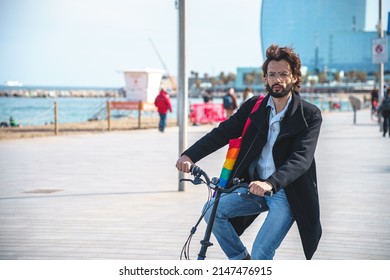 Gay Riding Bicycle On Embankment