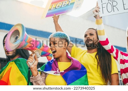 Gay and transgender people protest at pride event outdoor - Focus on lesbian girl face