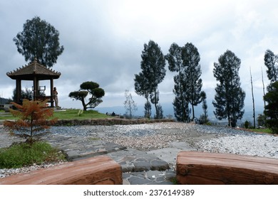 A gazebo between the trees