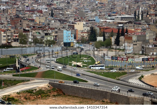 Gaziantep, Turkey - April 27 2019: A\
bird\'s-eye view of Gaziantep (Grand Hotel and its surroundings,\
City Center, Hospitals, Traffic, Old and New\
Buildings)