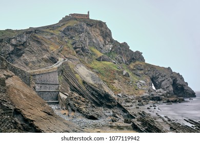 Gaztelugatxe islet with San Juan hermitage on top in Spain.s Basque Country is the real life location that features in TV series Game of Thrones as Dragonstone mystical island. Bermeo-Bizkaia-Euskadi. - Powered by Shutterstock