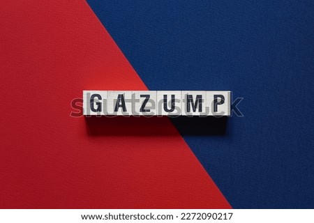 Gazump - word concept on cubes