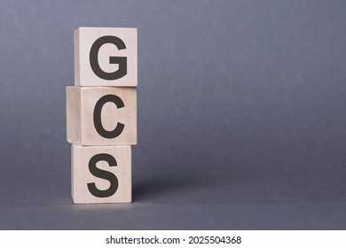 GCS (Glasgow Coma Scale) - Text, Written On Wooden Blocks, On Gray Background.