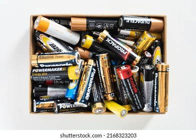 Gdans, Poland - June 2022: Alkaline Used Batteries AA And AAA Type In Box. Battery Recycling Concept.