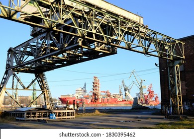 Gdansk, Poland - circa March 2020: Shipyard area with cranes and ships. The Imperial Shipyard Trail,  Gdansk Shipyard