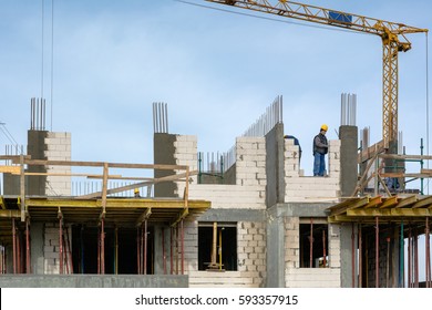 Gdansk, Poland, March 4, 2017: Bricklayer Lays Bricks To Form Building Walls At The Construction Site. 