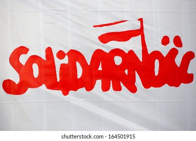 GDANSK, POLAND, SEPTEMBER 26: Official logo of Solidarnos, white flag with red letters. Poland 2013.