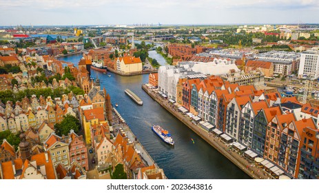 Gdansk, Poland,Europe. Beautiful Panoramic Aerial Photo From Drone To Old City Gdansk, Motlawa River And Gothic St Mary Church, City Hall Tower, The Oldest Medieval Port Crane (Zuraw) And Old Houses

