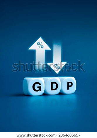 GDP business concept. Word 'GDP' Gross domestic product on white cube block near up and down arrows with percentage icon. Business growth and measure for the size of economy compiled for a country. [[stock_photo]] © 