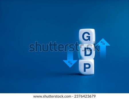 GDP business concept. Word 'GDP' Gross domestic product on white cube block stack near up and down arrows with percentage icon. Business growth and measure for size of economy compiled for country. [[stock_photo]] © 