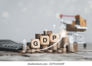 GDP concept with stack of coins and up arrow symbol. The economic situation has increased. Domestic Economy Finance, Management, Economy, Inflation economic recession and financial concepts