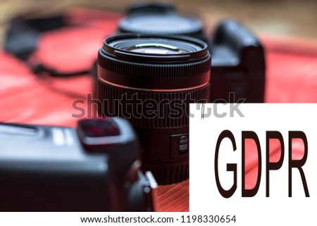 GDPR - LENS and flash behind the caption Data Protection . Cyber security and privacy