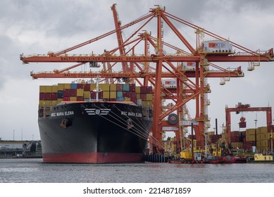 GDYNIA - POLAND - 2022: Transshipment Of A Container Ship At The Quay Of A Seaport Terminal