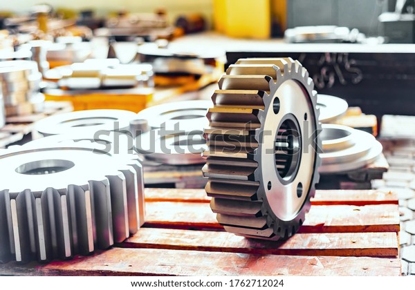 Gear after\
heat treatment. The large gear after manufacturing on the gear\
cutter and milling machine is in\
stock