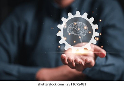 gear, cog, brain, idea, strategy, creativity, information, knowledge, imagination, creative. on hand showing the gear or cog in that's has brain and creativity idea strategy. information knowledge. - Shutterstock ID 2311092481