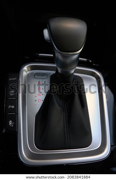 Gear lever of an automatic car and\
the positions, P, R, N and D that we can put\
illuminated