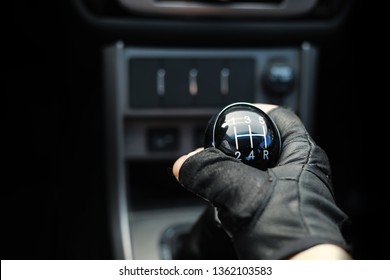 Gear lever. Manual Transmission. Hand on the gear shift in the car. - Shutterstock ID 1362103583