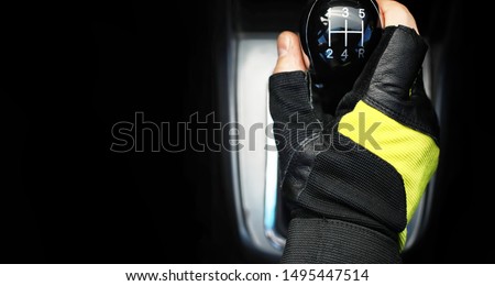 Gear lever. Manual Transmission. Hand on the gear shift in a car.