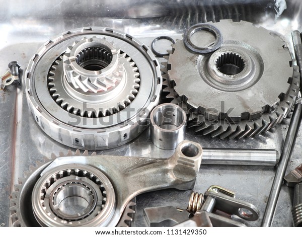 The Gear\
parts from car transmission\
dis-assembly.