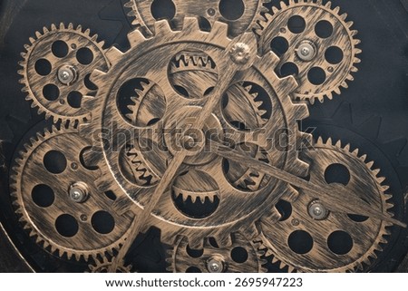 Gear wheels, clockwork close up. Vintage clock mechanism, close-up fragment with shiny gears. Mechanical Clock Movement Showing Gears, Wheels and Balance Mechanism. Concept of Time