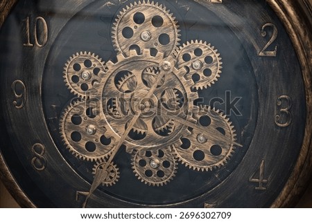 Gear wheels, clockwork close up. Vintage clock mechanism, close-up fragment with shiny gears. Mechanical Clock Movement Showing Gears, Wheels and Balance Mechanism. Concept of Time