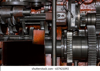 Gearbox with gears in housing. Gears of the gear motor. A device for lowering the speed of rotation. Machine assembly. Industry.