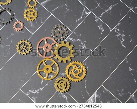Gears and Cogs in a Dark Backdrop