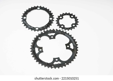 Gears, Sprockets And Chain Of A Mountain Sports Bike On A White Background. Bicycle Parts