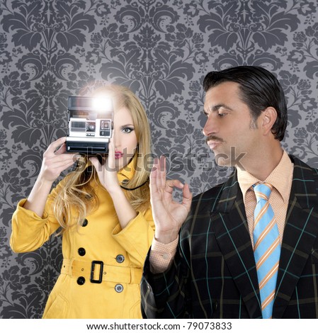 geek tacky mustache man reporter fashion girl photo shoot retro wallpaper [Photo Illustration]