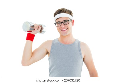 Geeky hipster posing in sportswear with dumbbell on white background