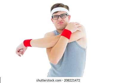 Geeky hipster posing in sportswear on white background