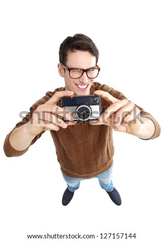Geeky man with vintage camera
