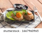 Gefilte fish with beetroot salad, traditional Jewish food.