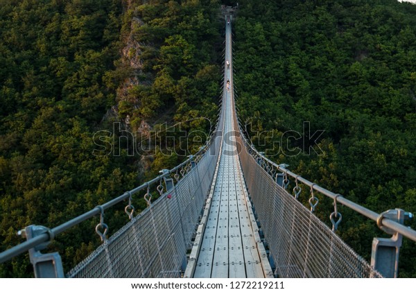 Geierlay-It is\
the longest rope bridge in Germany. Following the example of\
Nepalese hanging rope bridges, the Geierlay suspension rope bridge\
swings from one bridgehead to the\
other.