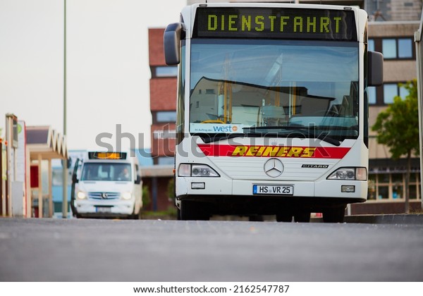 Geilenkirchen-NRW-Deutschland-05.30.2022: a bus\
with a business trip that is at the\
station