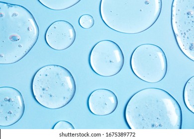 Gel drops forming background. Virus protection or cosmetics concept.