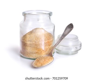 Gelatin or gelatine in the glass jar. On white background