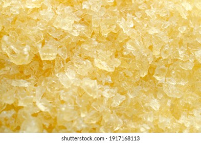 Gelatin, Yellow Powder Top View. Background, Texture Of Crystals Of Gelatin, Close-up. Dry Gelatin Texture, Top View. Dry Yellow Gelatin Powder, Top View. Pile Of Isinglass, Top View.