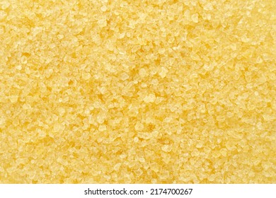 Gelatin, Yellow Powder Top View. Background, Texture Of Crystals Of Gelatin, Close-up. Dry Gelatin Texture, Top View. Dry Yellow Gelatin Powder, Top View. Pile Of Isinglass, Top View.