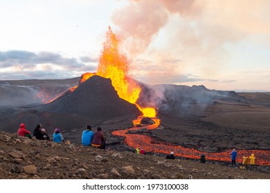 GELDINGADALIR, ICELAND - MAY 11, 2021: A small volcanic eruption has started at the Reykjanes peninsula. The event has attracted thousands of visitors who have braved a daring hike to the crater.