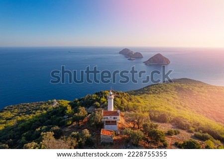 Gelidonya lighthouse Lycian Way in Antalya, Turkey Aerial top view. Concept beautiful summer landscape at sunset from drone.