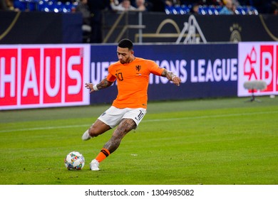 GELSENKIRCHEN - NOV 19, 2018: Memphis Depay 10 Shoots A Free Kick. Germany - Netherlands. UEFA Nations League. Schalke 04 Stadium.