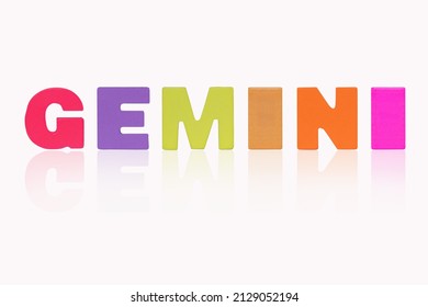 GEMINI is 12 Zodiac isolated on white background. Poster, banner. Colorful wooden alphabet set sort. English letter made of wood arrange alphabet as categorize suitable Suitable for studying astrology