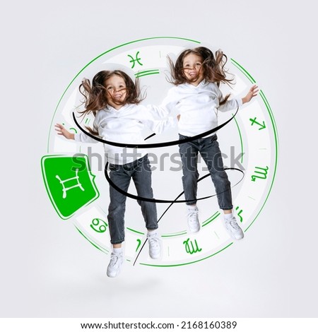 Gemini. Creative portrait of happy little girl with drawing of zodiac signs isolated on light background with pencil sketches. Concept of birthday, person's character, year, horoscope. Design for card