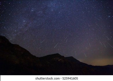 Geminid Meteor In The Night Sky