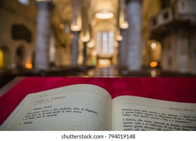 GEMONA, FRIULI-VENEZIA GIULIA ITALY - NOVEMBER, 2017: interior detail of Cathedral of Santa Maria Assunta: opened bible, in Gemona del Friuli, Friuli-Venezia Giulia, Italy
