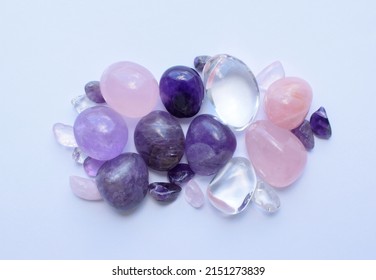 Gems Of Various Colors. Amethyst, Rose Quartz And Rock Crystal On White Background