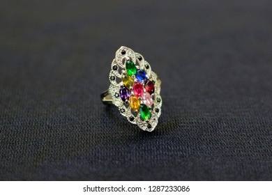 A gemstone ring is a beautiful jewelry on a black cloth. - Shutterstock ID 1287233086