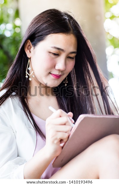 gen-z-asia-pretty-business-woman-stock-photo-1410193496-shutterstock